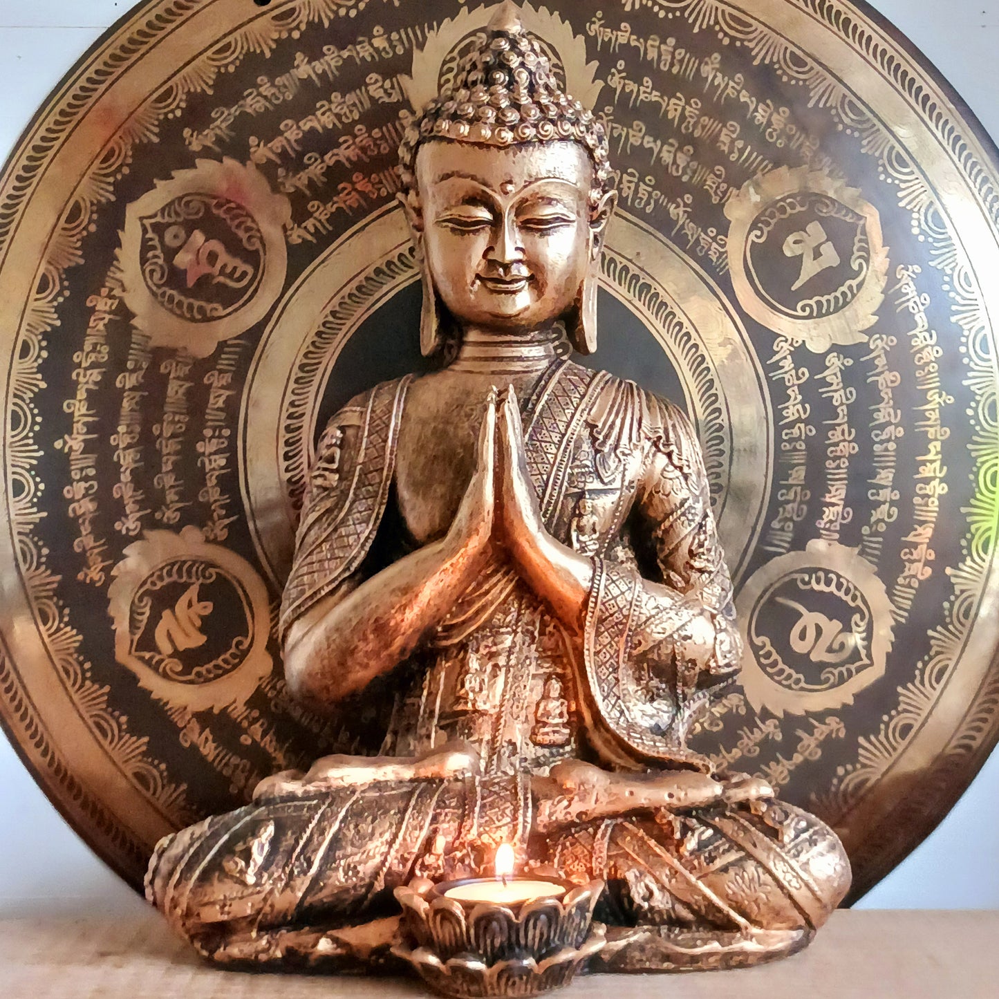 Bring a sense of calm and harmony to any space with this stunning Gold Effect Thai Buddha Tealight Holder. Crafted with beautiful detailing, this serene Buddha sits in a peaceful meditating pose while gently cradling a space for a tealight.