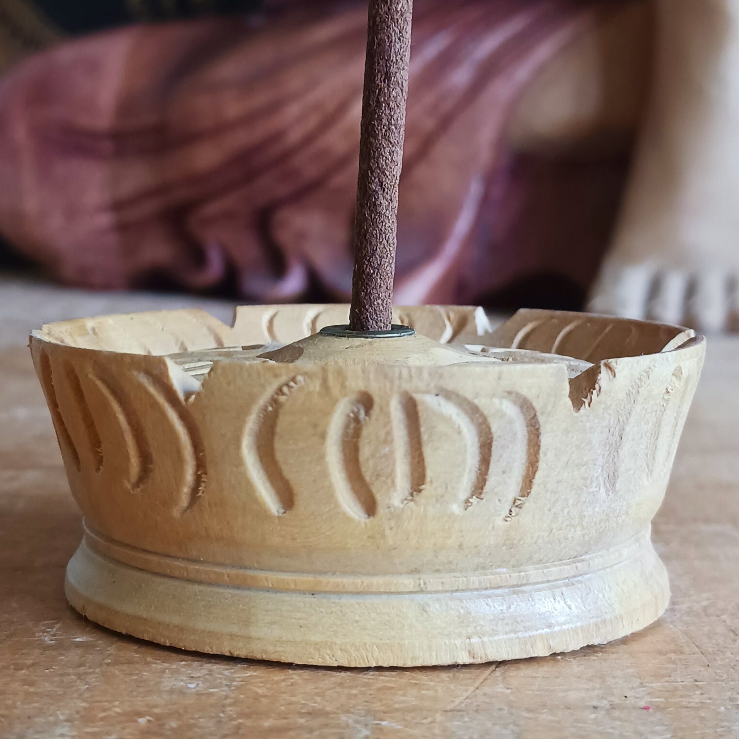This beloved Lotus Tibetan Incense Holder is a simple yet sacred companion for your incense practice. Hand-carved from a single piece of soft yellow wood in Nepal, each piece carries the gentle energy of mindful craftsmanship and Buddhist symbolism.