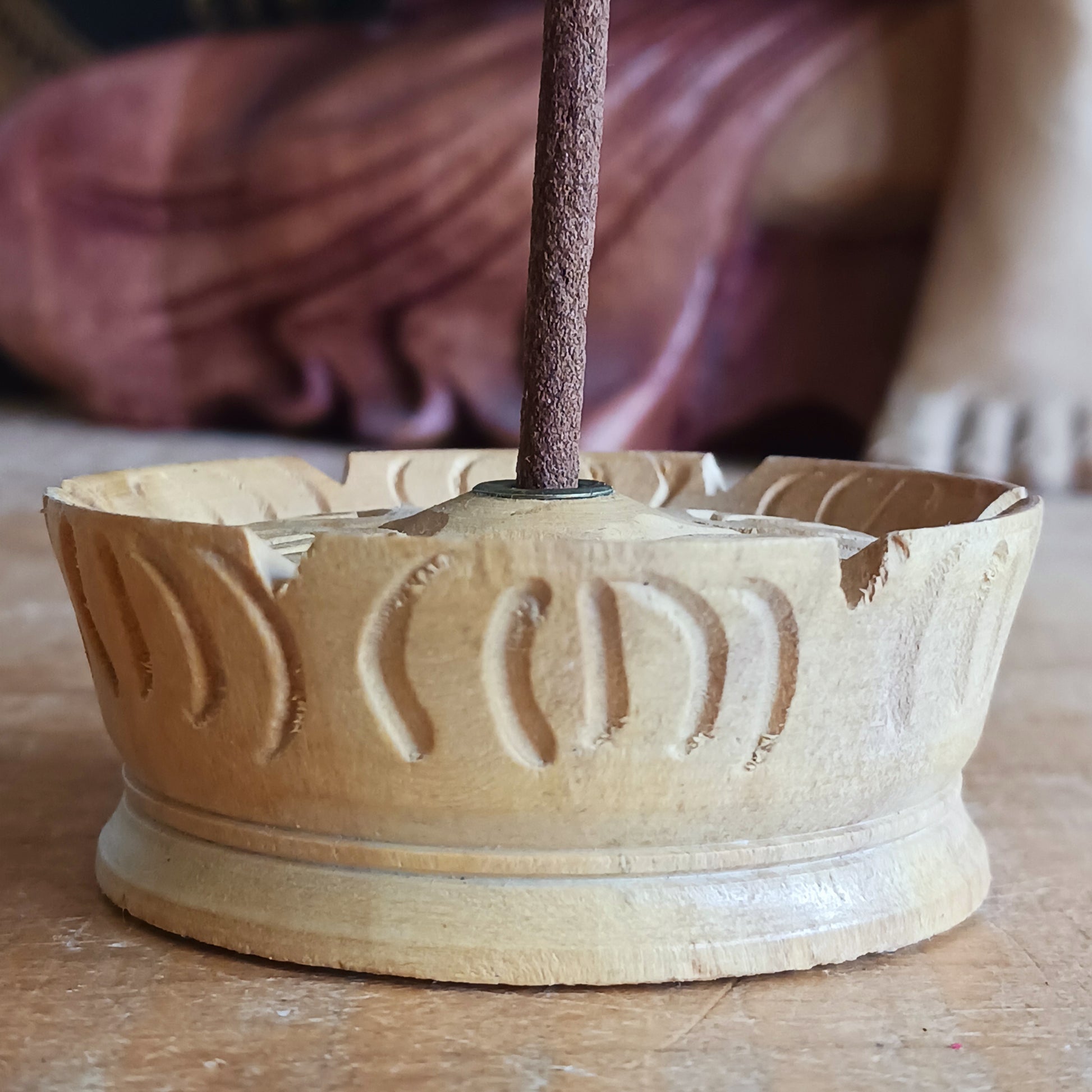 This beloved Lotus Tibetan Incense Holder is a simple yet sacred companion for your incense practice. Hand-carved from a single piece of soft yellow wood in Nepal, each piece carries the gentle energy of mindful craftsmanship and Buddhist symbolism.