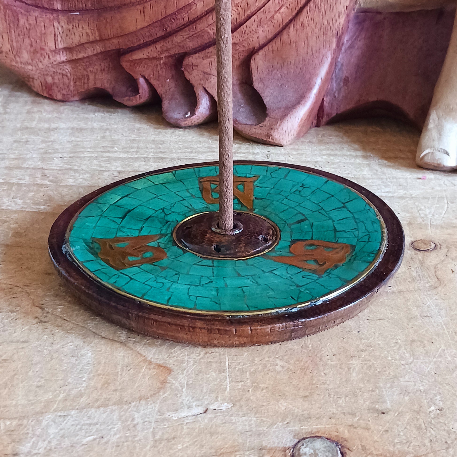 Elevate your meditation, yoga, or relaxation rituals with this hand-crafted Tibetan Om Wooden Incense Burner, skilfully made in Nepal under Fairtrade guidelines. Designed with the sacred Om symbol, this incense holder embodies harmony, mindfulness, and spiritual protection.