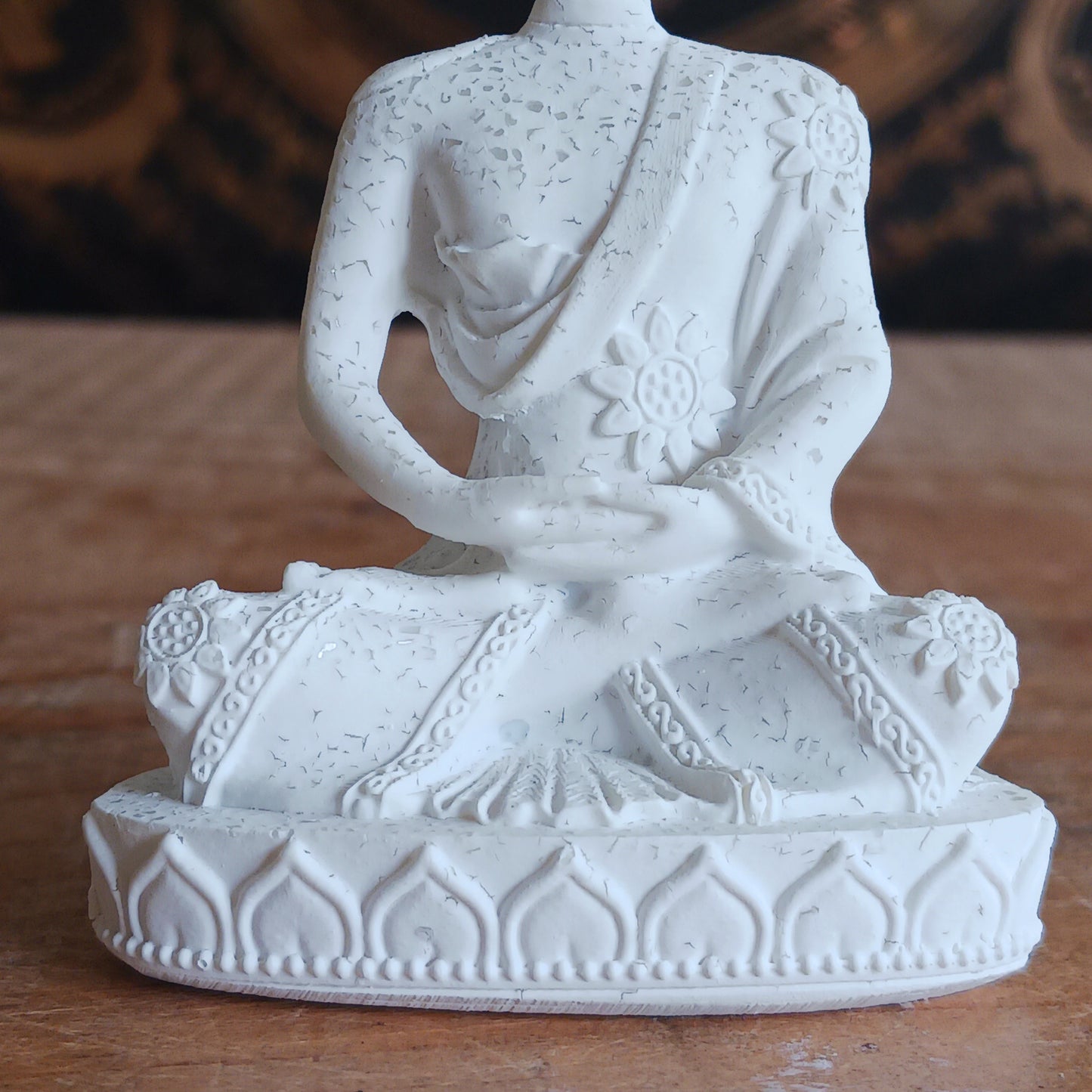 This small white serene Buddha statue is with meditation mudra. &nbsp;Bring peace and calm to your space with this elegant little Buddha statue. Crafted with attention to detail, this serene figurine features the Buddha in a traditional meditation mudra, symbolizing inner peace,