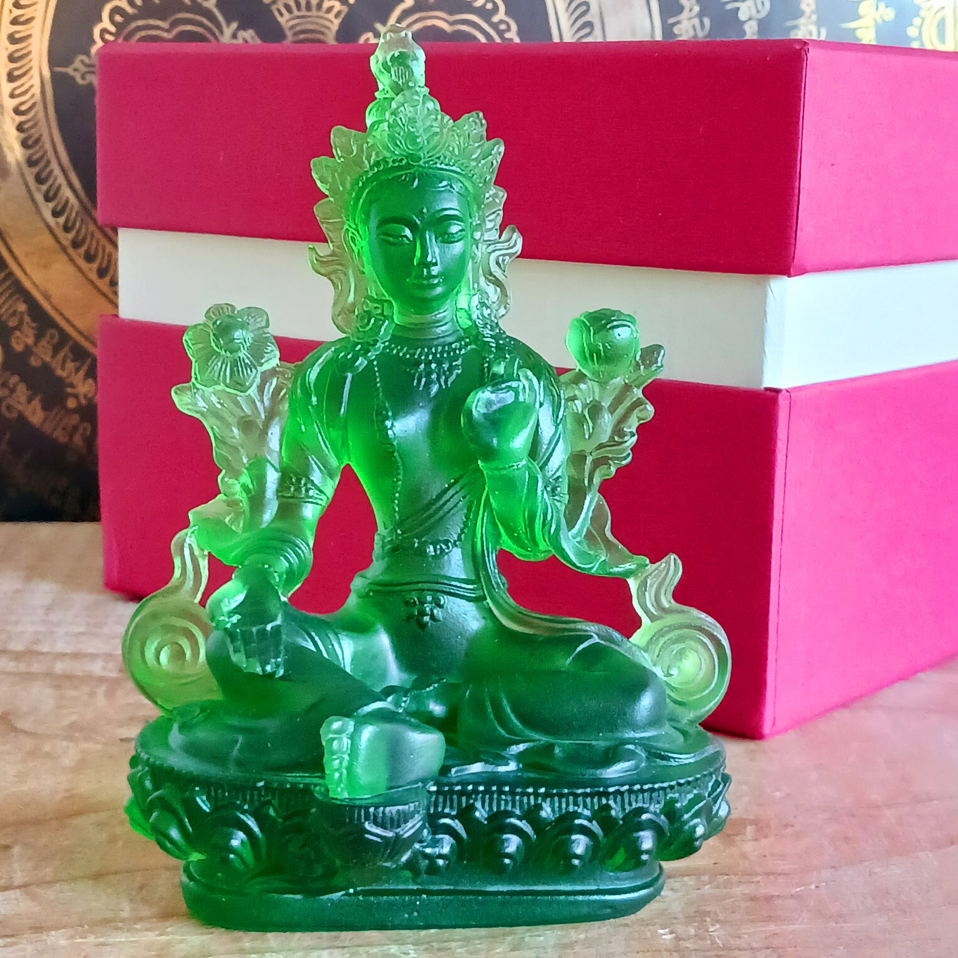 Bring serenity and divine feminine energy into your space with this stunning transparent Green Tara statue, crafted from high-quality glazed glass. Known as the "Mother of all Mothers," Green Tara represents compassion in action. Her graceful posture—one leg extended—symbolizes her readiness to help all beings instantly.