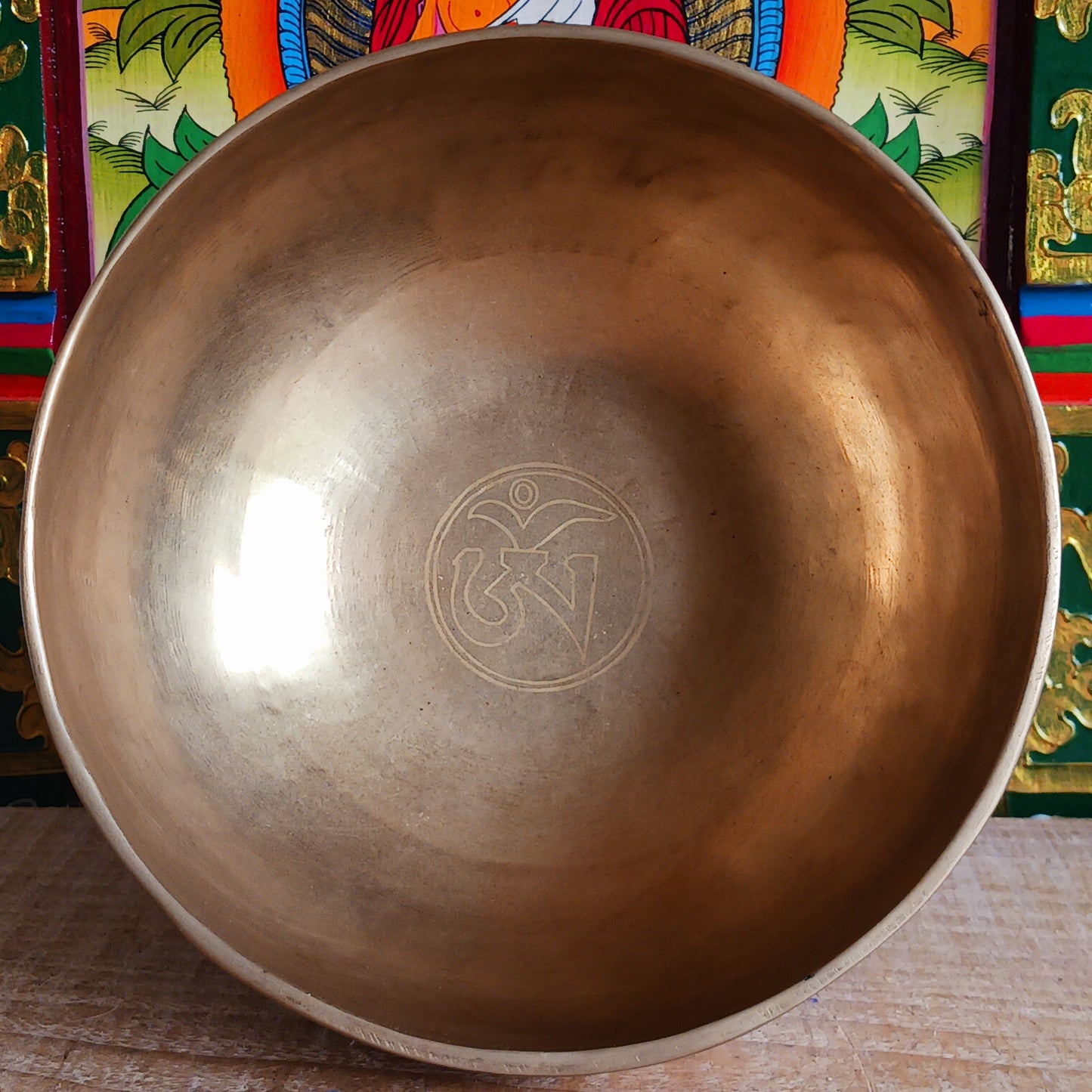 Elevate your meditation and sound healing practice with this Classic Hand-Hammered Singing Bowl, beautifully engraved with the sacred OHM symbol inside the bowl. This is a unique, one-of-a-kind item—you will receive exactly the bowl pictured.