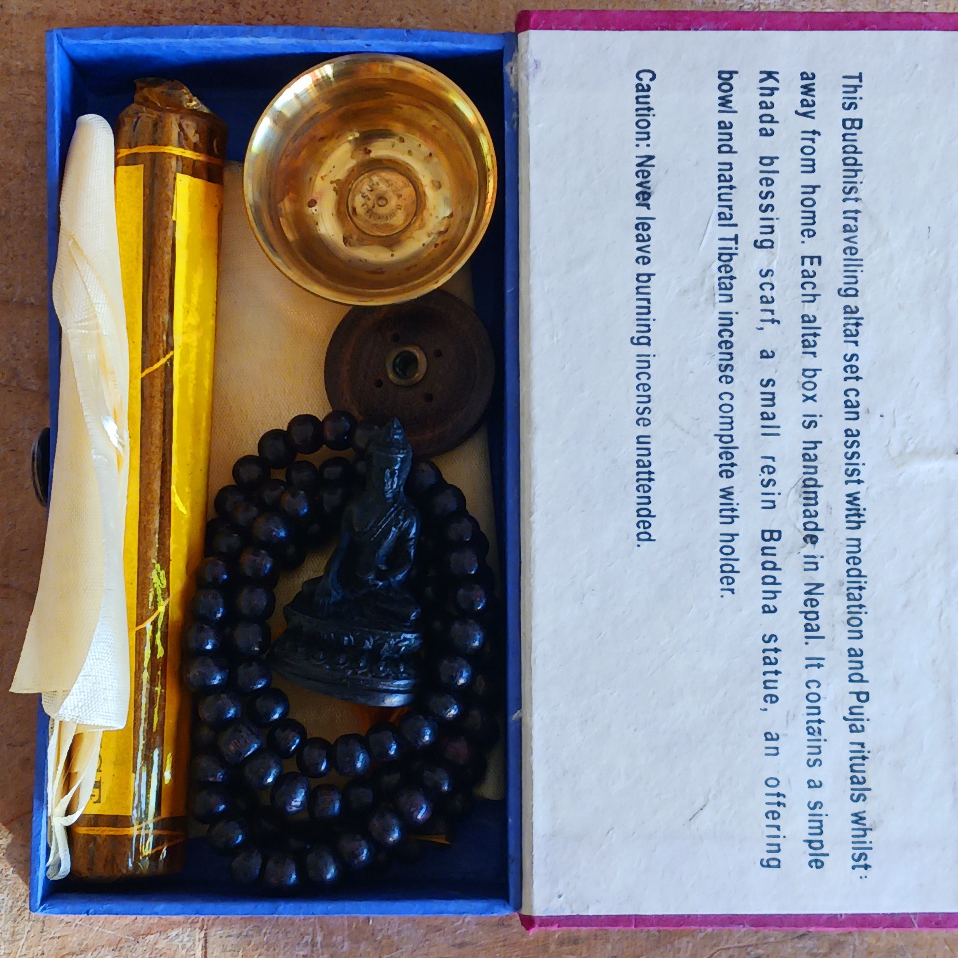 Elevate your meditation and Puja practice wherever your journey takes you. This Handmade Nepalese Buddhist Travelling Altar Set provides a complete, compact sacred space for spiritual grounding on the road or away from home.