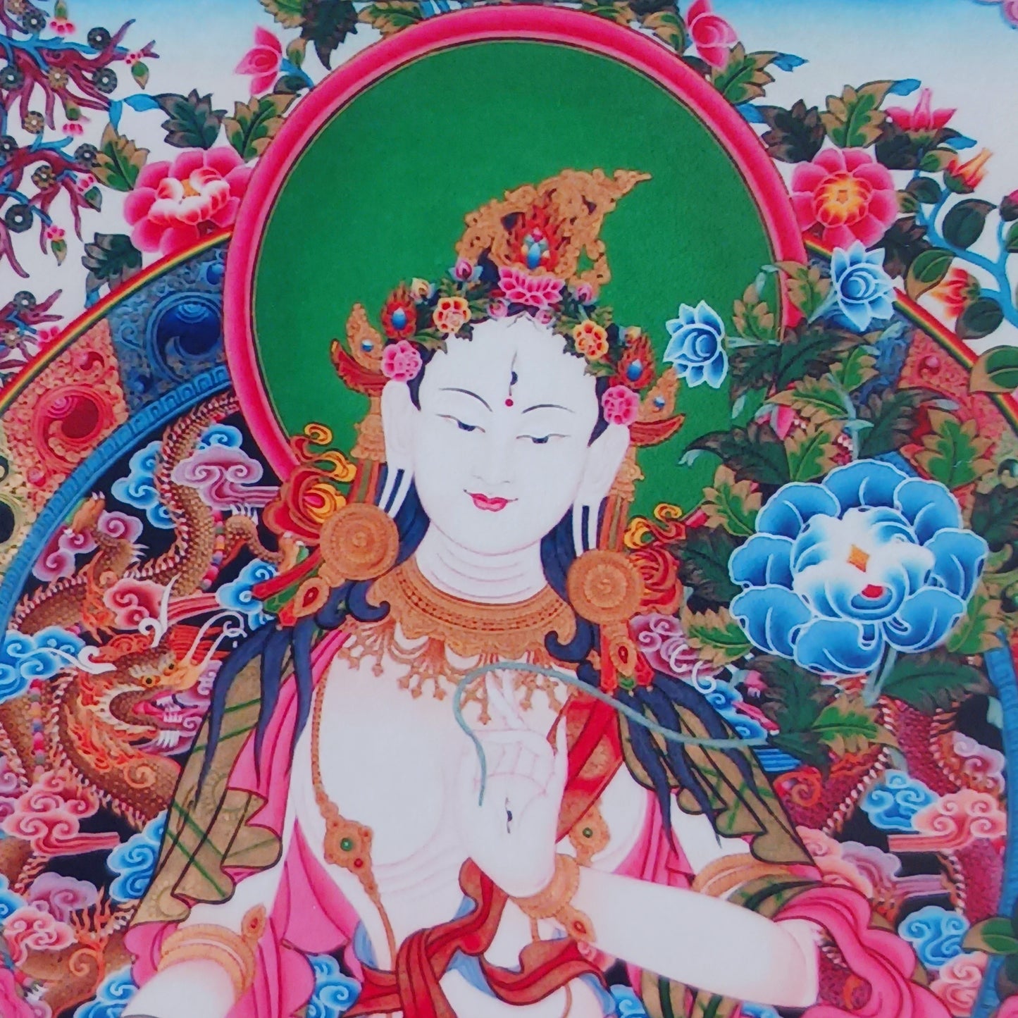 Beautiful small thangka of White Tara with silk brocade. Symbol of purity, compassion & longevity. Ideal for meditation, altar, or spiritual décor.