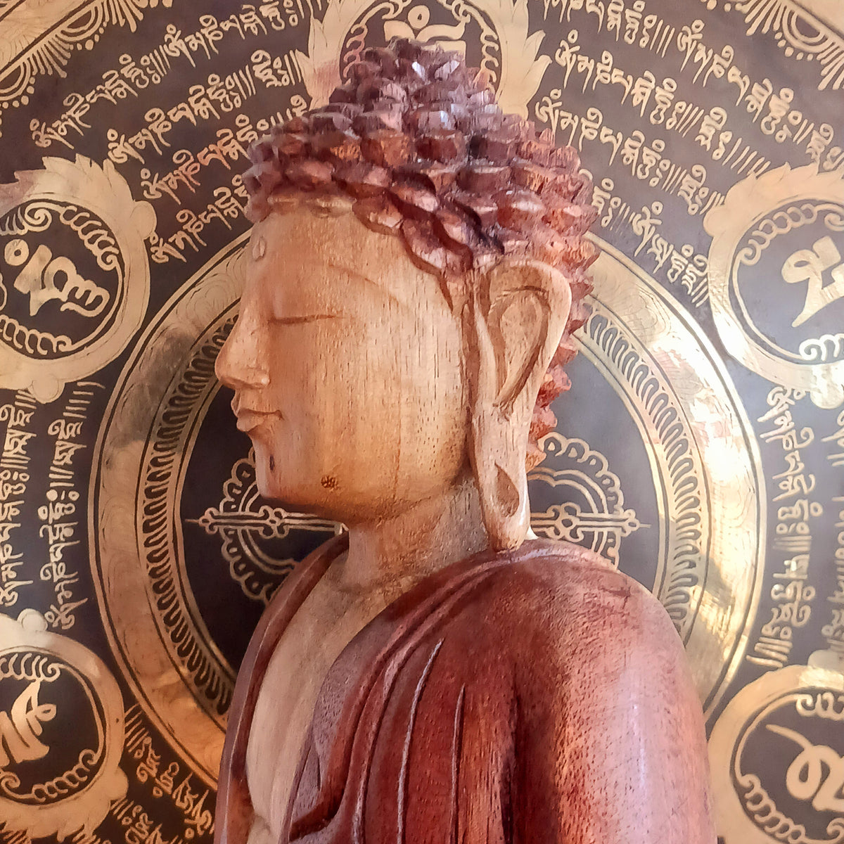 Bring a sense of peace, serenity and mindfulness into your home with this beautiful large Hand Carved Wooden Meditating Buddha Statue. Traditionally crafted in Bali from sustainable Suar wood, each statue is a unique work of art, showcasing the natural beauty of the wood and the skill of the artisan.