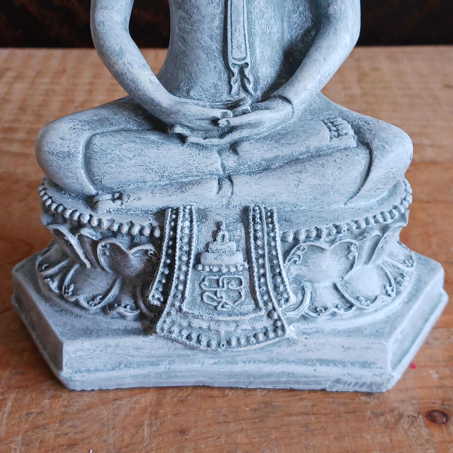 Invite peace and mindfulness into your space with this serene grey Thai-style Buddha statue. Crafted to reflect traditional Thai artistry, this elegant piece features a meditating Buddha seated gracefully on a throne. The calm expression and intricate detailing make it a perfect centerpiece for your home, meditation area, or spiritual altar. Ideal for anyone seeking a touch of tranquility and spiritual inspiration in their décor.