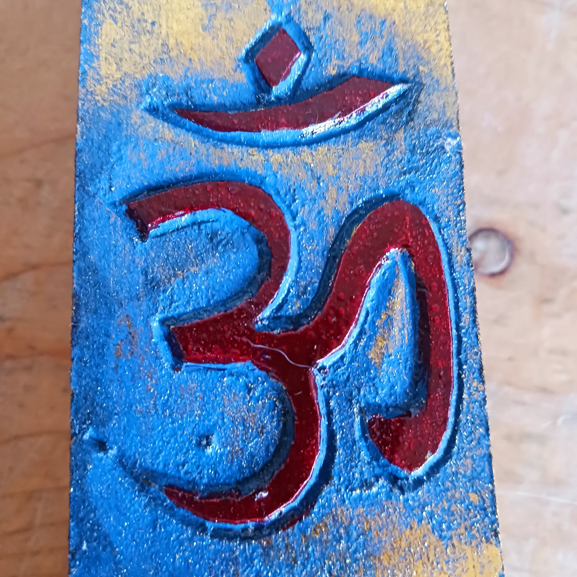 Create a calm, aromatic atmosphere in your home with this beautifully handcrafted OM incense holder. Made from responsibly sourced wood, this unique piece features a delicately hand-carved OM symbol, making it both a functional incense burner and a decorative spiritual accent.