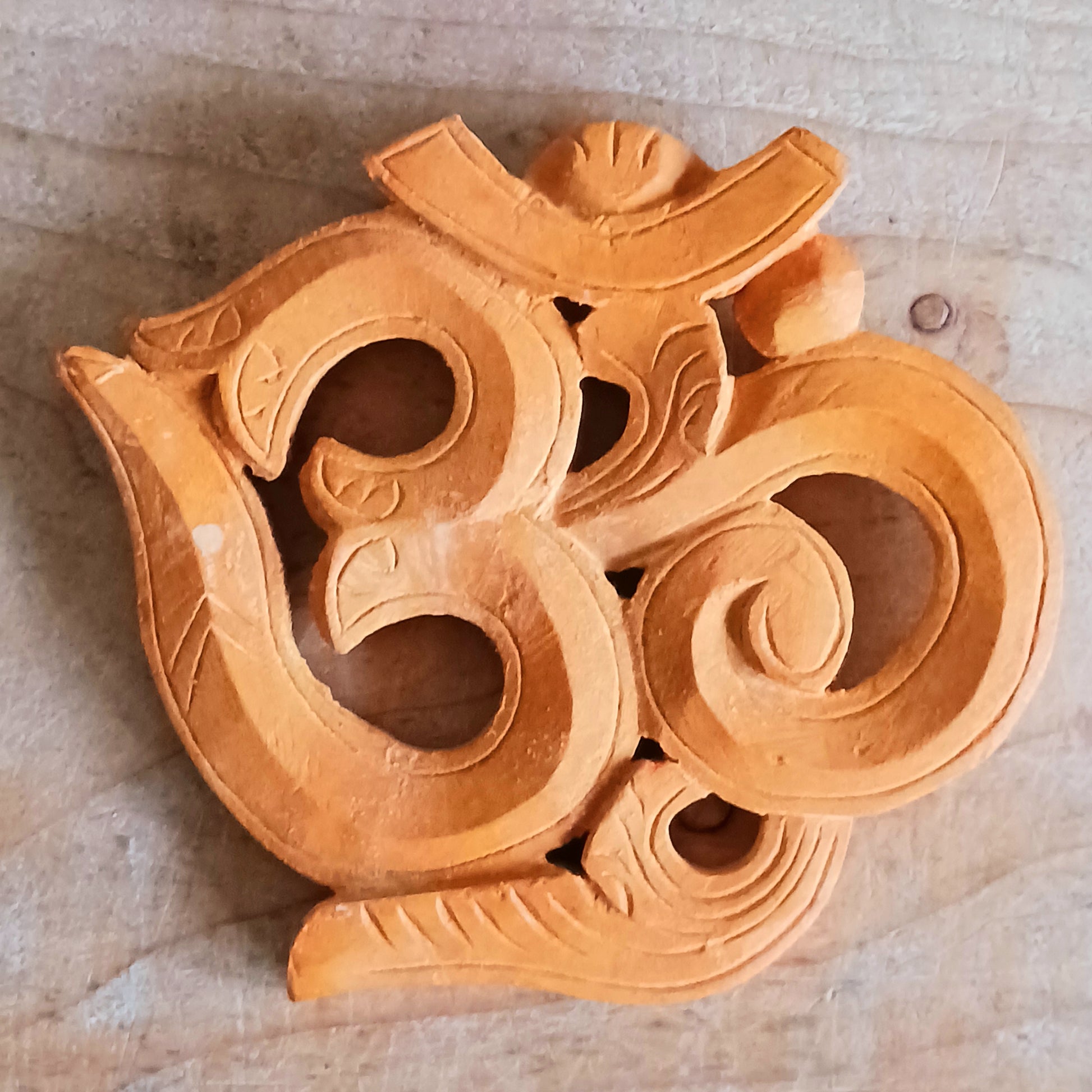 Bring peace, harmony, and divine energy into your home with this handmade Wooden Om Wall Hanging, crafted from sustainably sourced wood. Featuring the sacred Om symbol, this piece blends hand crafted artistry with deep spiritual meaning.