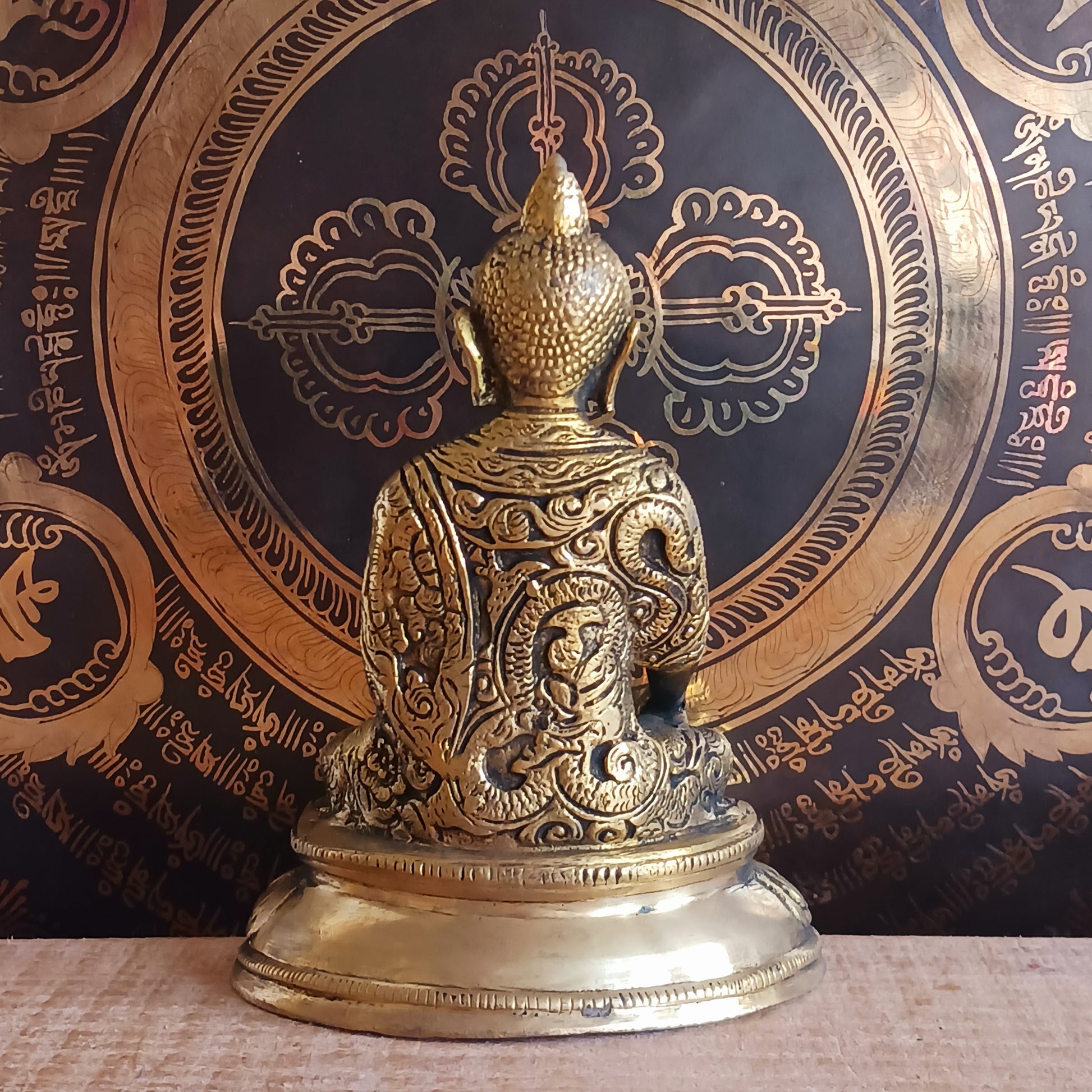 Elevate your spiritual space with this exquisite Akshobya Buddha statue, expertly cast in heavy brass and engraved with intricate detail. Representing one of the five Dhyani Buddhas, Akshobya is visualized in blue and associated with the heart chakra, symbolizing the transformation of anger and sadness into love and compassion.