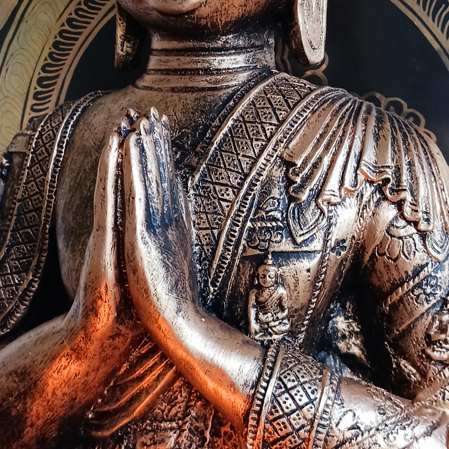 Bring a sense of calm and harmony to any space with this stunning Gold Effect Thai Buddha Tealight Holder. Crafted with beautiful detailing, this serene Buddha sits in a peaceful meditating pose while gently cradling a space for a tealight.