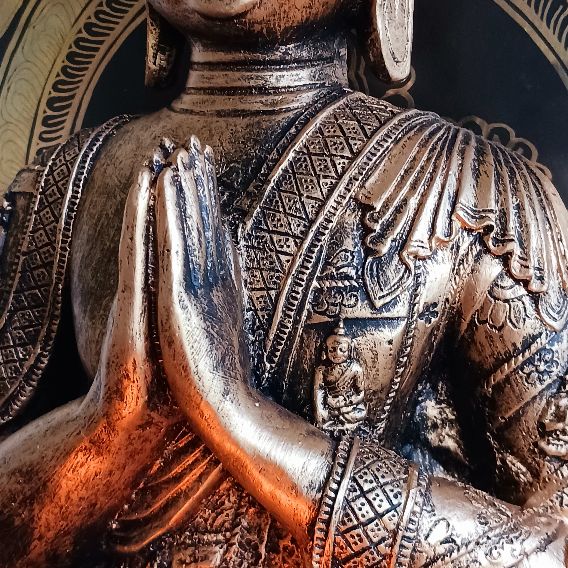 Bring a sense of calm and harmony to any space with this stunning Gold Effect Thai Buddha Tealight Holder. Crafted with beautiful detailing, this serene Buddha sits in a peaceful meditating pose while gently cradling a space for a tealight.