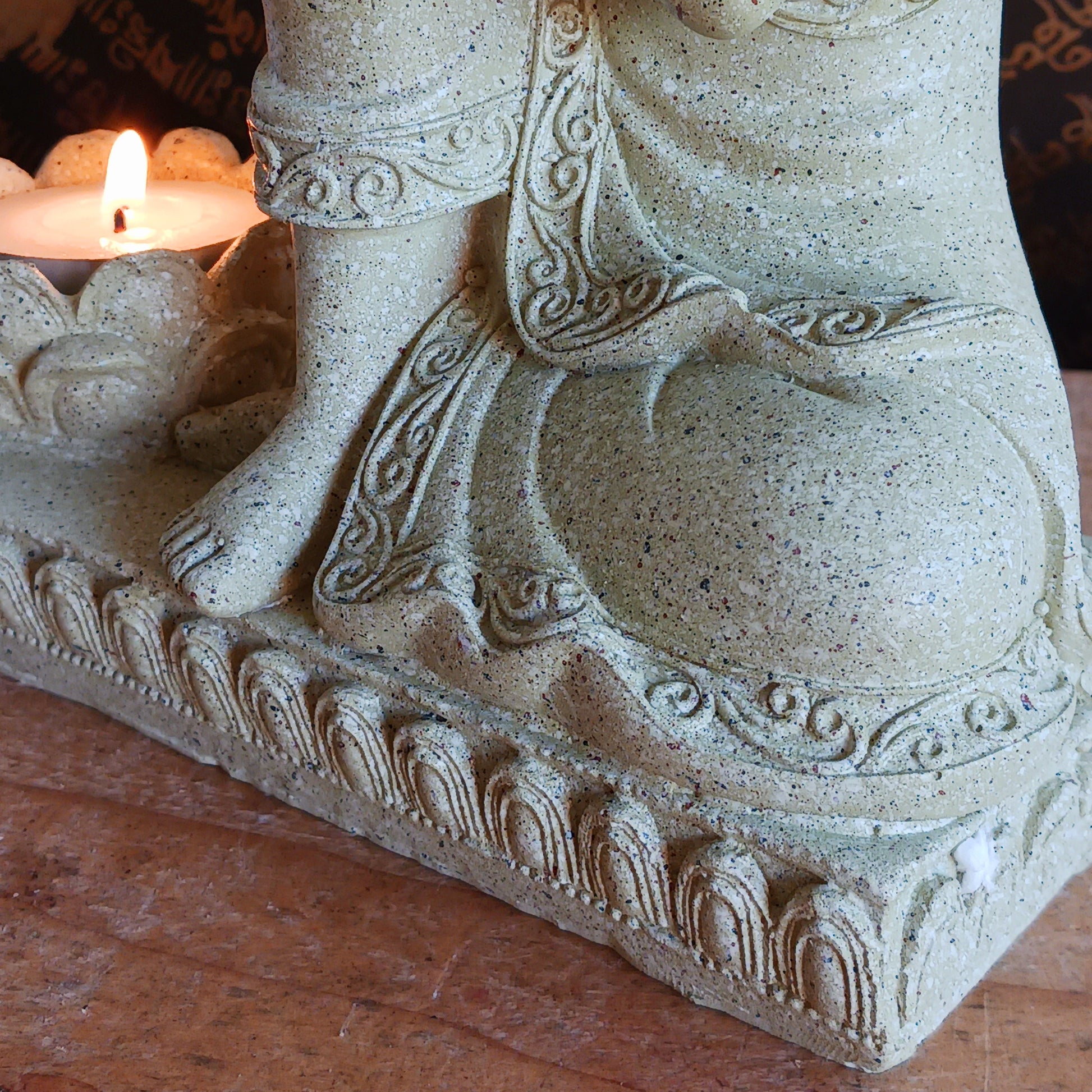 Elevate your space with this beautifully crafted Serene Relaxing Buddha Statue, perfect for creating a calming ambiance. Made from high-quality resin, the statue showcases intricate details, from the gentle expression of the Buddha to the delicately designed lotus flower that serves as a candle holder.