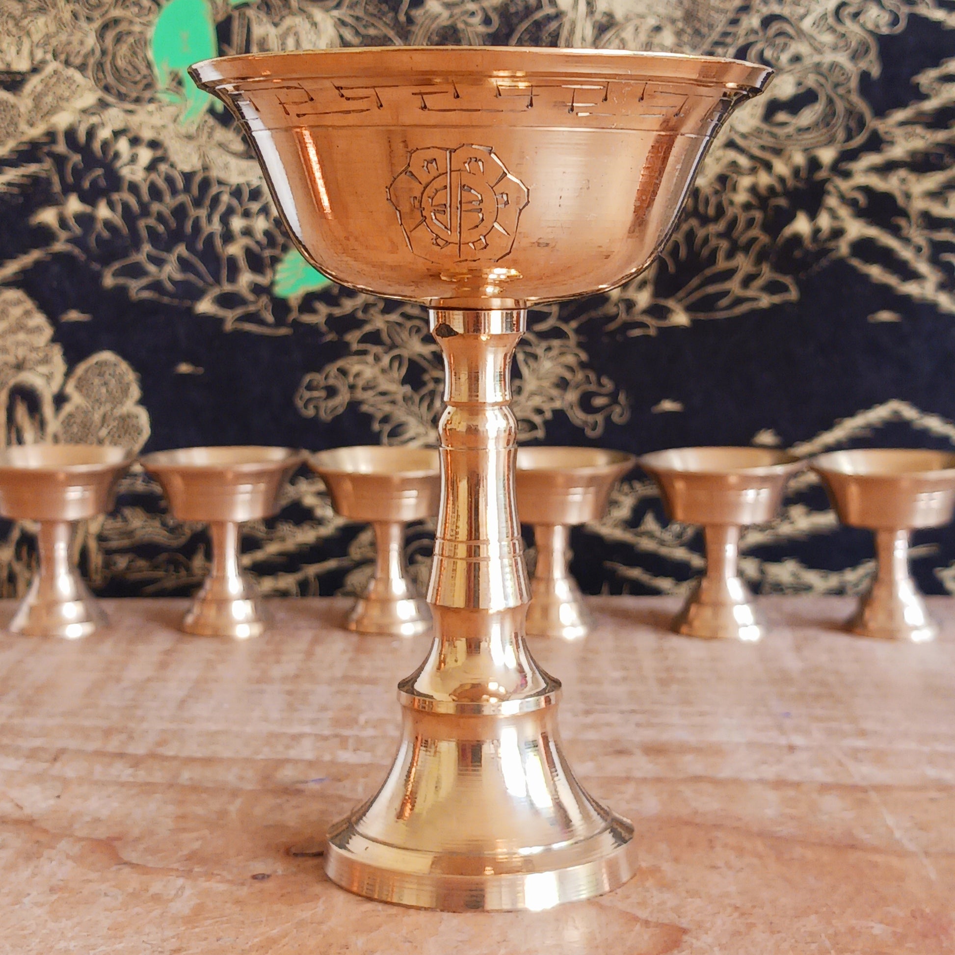 Illuminate your spiritual space with this beautiful Traditional Brass Tibetan Butter Lamp, a sacred symbol used across Himalayan temples and homes. These simple lamps are a cornerstone of Tibetan Buddhist practice, traditionally lit each morning to represent the illumination of wisdom and to dispel ignorance.