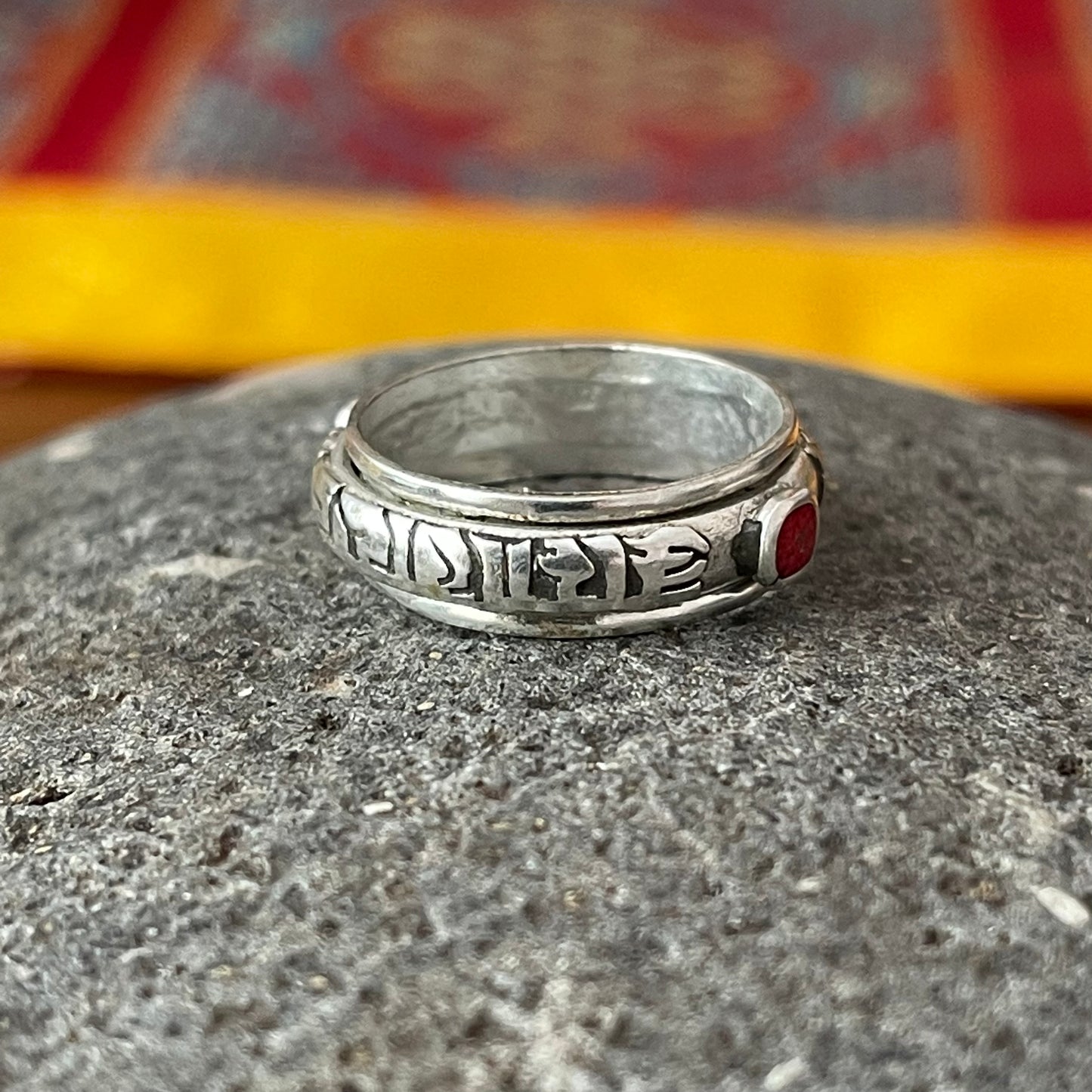 Om Mani Padme Hum Spinning ring Red Stone