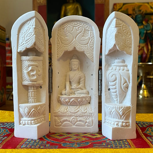 Small Buddha in triptych