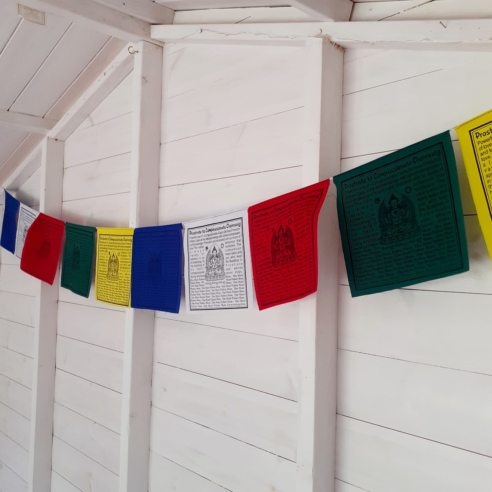 Tibetan Buddhist Prayer flags  |  Chenrezig